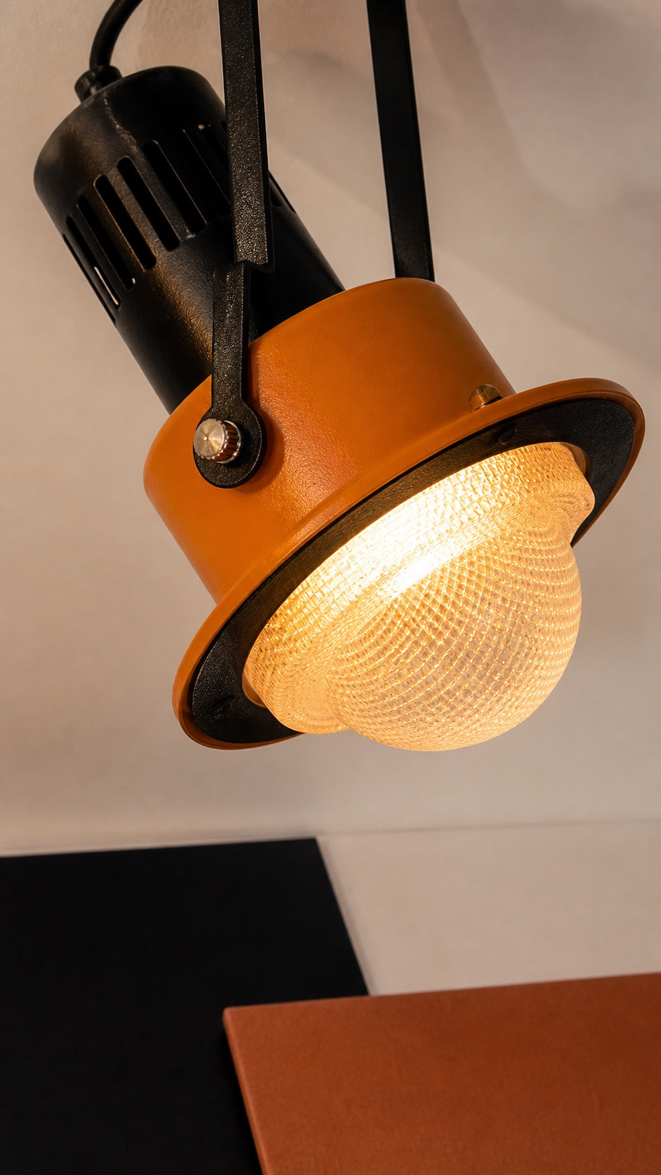 Orange painted ring and textured PMMA diffuser detail