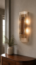 Three-quarter view of the Cinder Veil vertical wall-mounted sconce