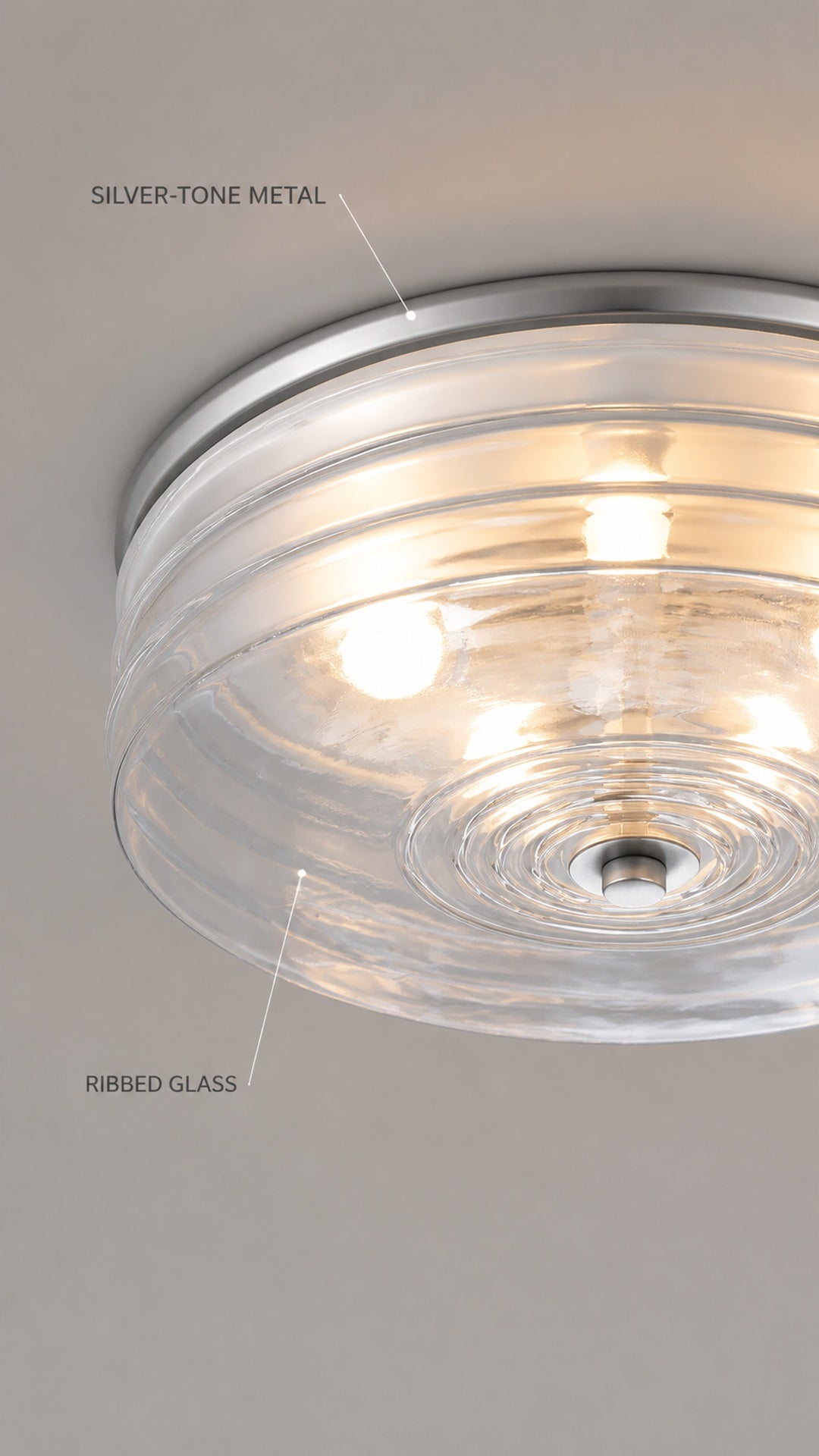Ringed glass and silver-tone metal detail
