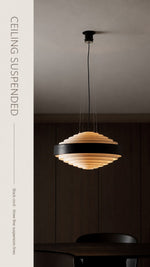 Noir Step Pendant ceiling suspended with black cord and three fine suspension lines