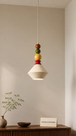 Ceiling-suspended relationship of the Memphis Bead Pendant