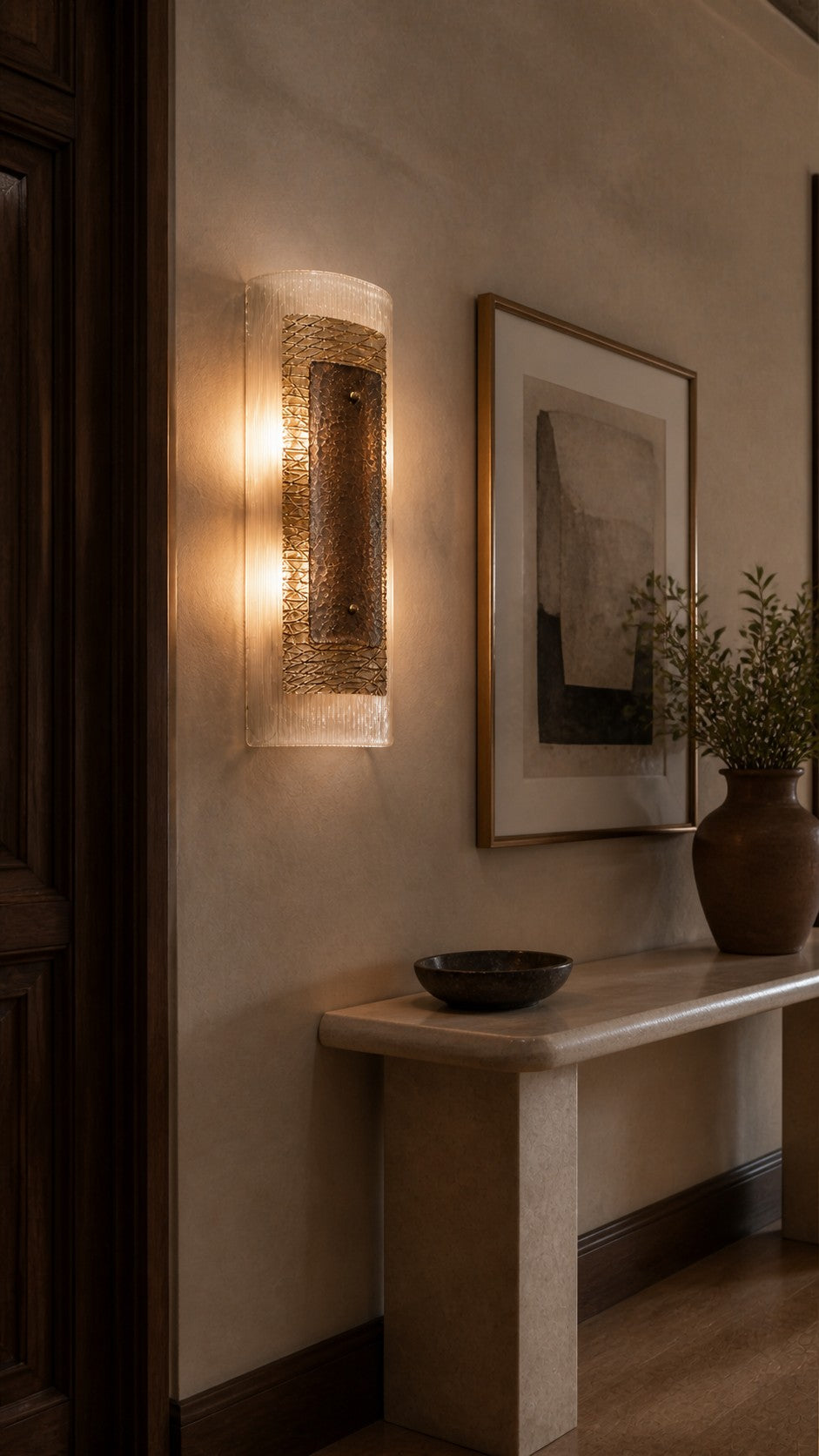 Cinder Veil wall sconce in a modern-classic entryway