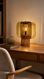 Amber Grid table lamp on a natural oak study desk