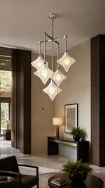 Stella Fold chandelier in a boutique hotel entry