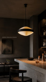 Noir Step Pendant in a Nordic-Bauhaus boutique hospitality interior