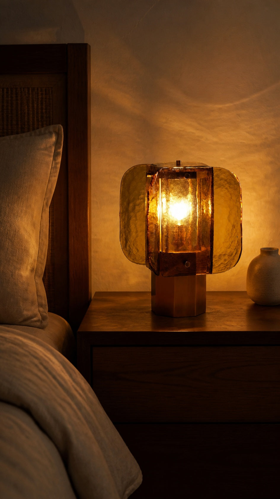 Amber Grid table lamp in a warm bedroom evening setting