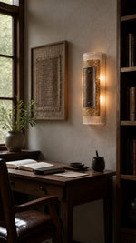 Cinder Veil wall sconce beside a walnut study console