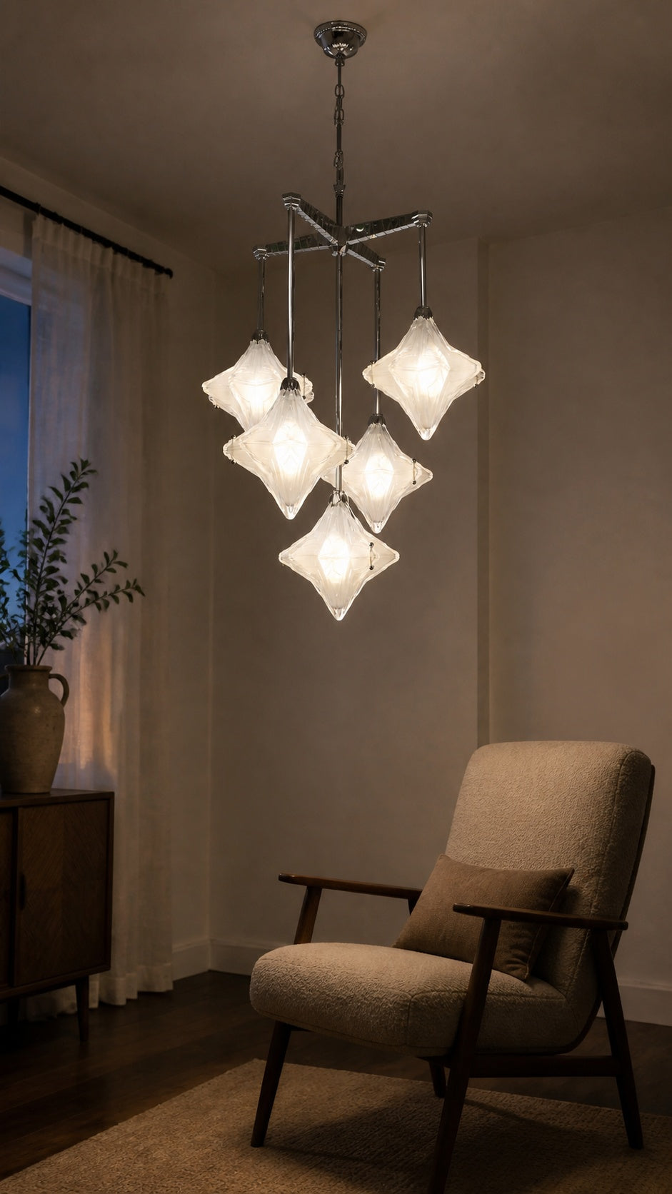 Stella Fold chandelier in a bedroom reading corner