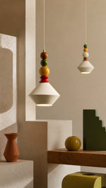 Color-block Memphis pendant in a warm editorial interior