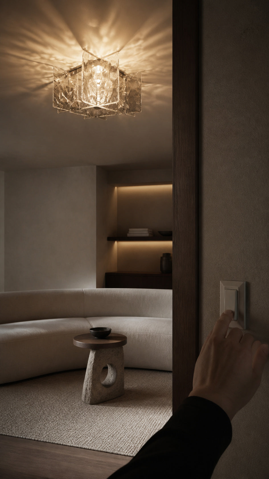 Glass Orbit ceiling light shown in a human-scale living room scene