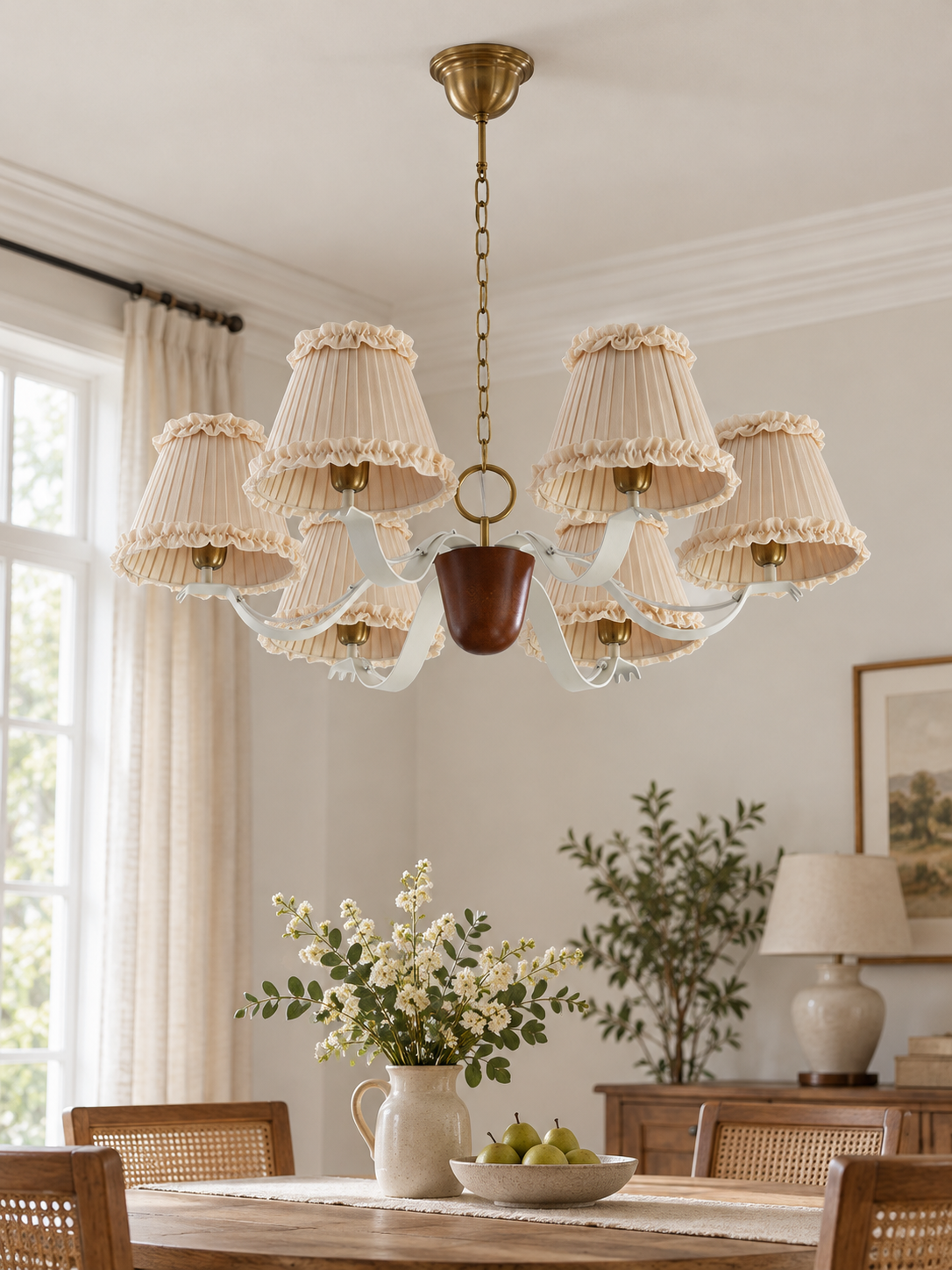 Round 6-light chandelier with cream ruffled fabric shades, shown switched off in daylight
