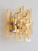 Satin Nickel wall sconce with amber textured glass panels, shown switched off in daylight