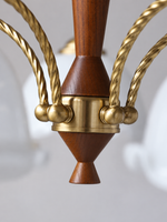 Ivory glass shade and curved arm detail