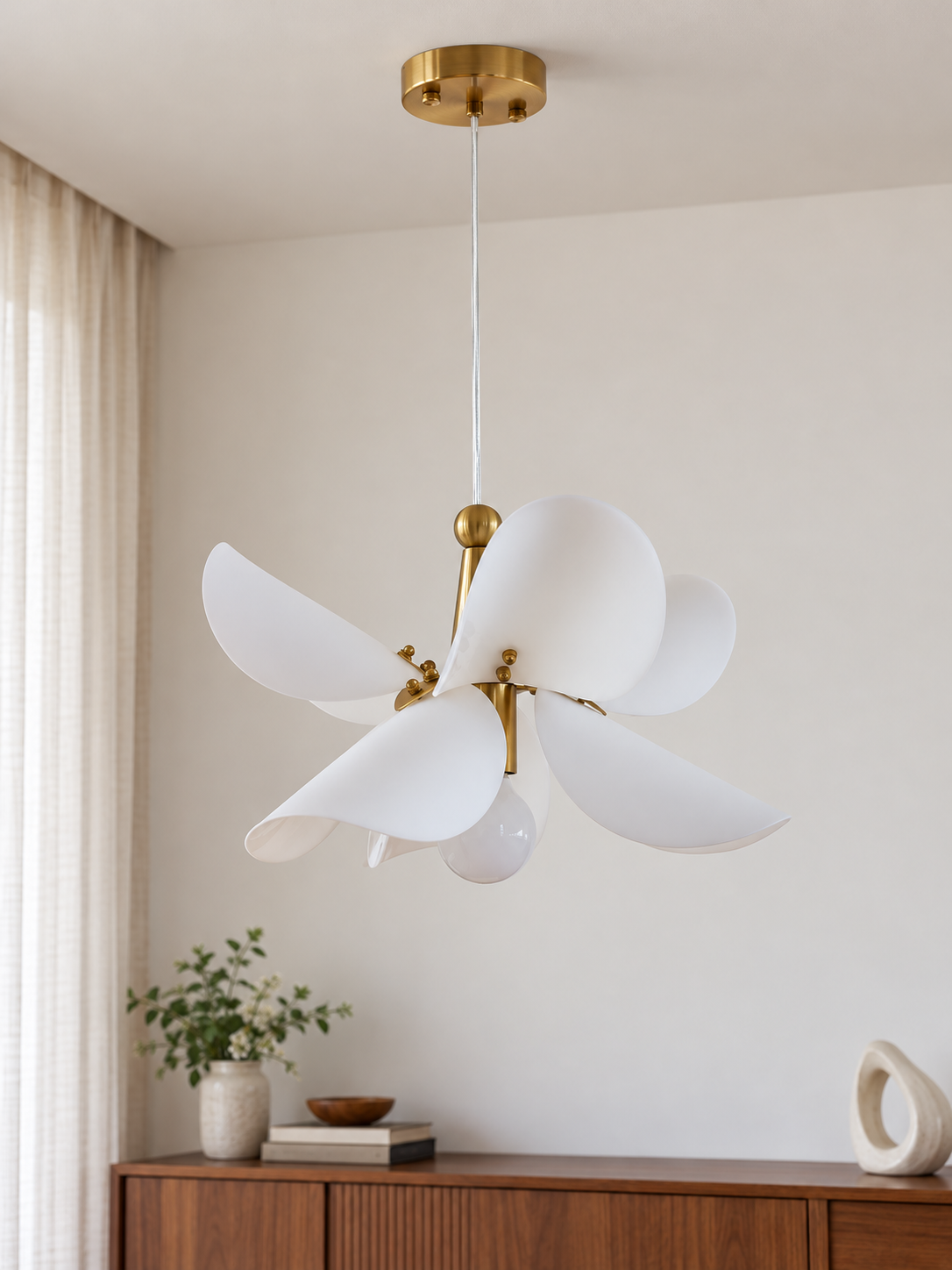 Large 36 cm copper-tone and white acrylic petal pendant, switched off in a daylight living-room corner