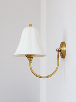 Copper-tone and white ceramic bell wall light, lamp off