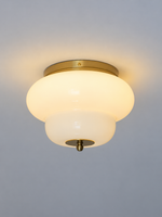 Copper-tone rounded tier white glass ceiling light