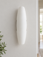 Curved glass wall light detail, lamp off
