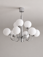 Chrome and white glass nine-light chandelier, shown switched off in a neutral studio