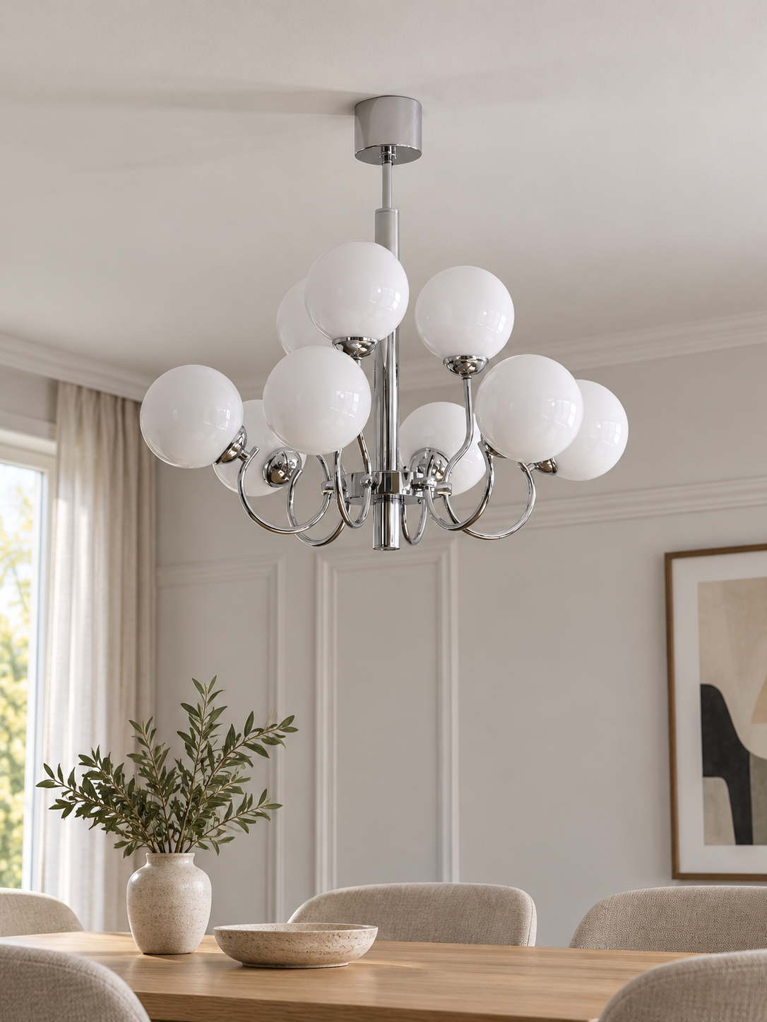 Chrome and white glass nine-light chandelier, shown switched off in a daylight dining room