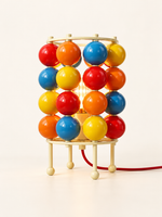 Colorful sphere table sku with cream metal frame and red cord
