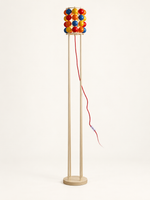 Colorful sphere floor sku with cream metal frame and red cord