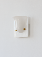 White single head resin cup wall sconce with gold-tone fasteners, shown unlit