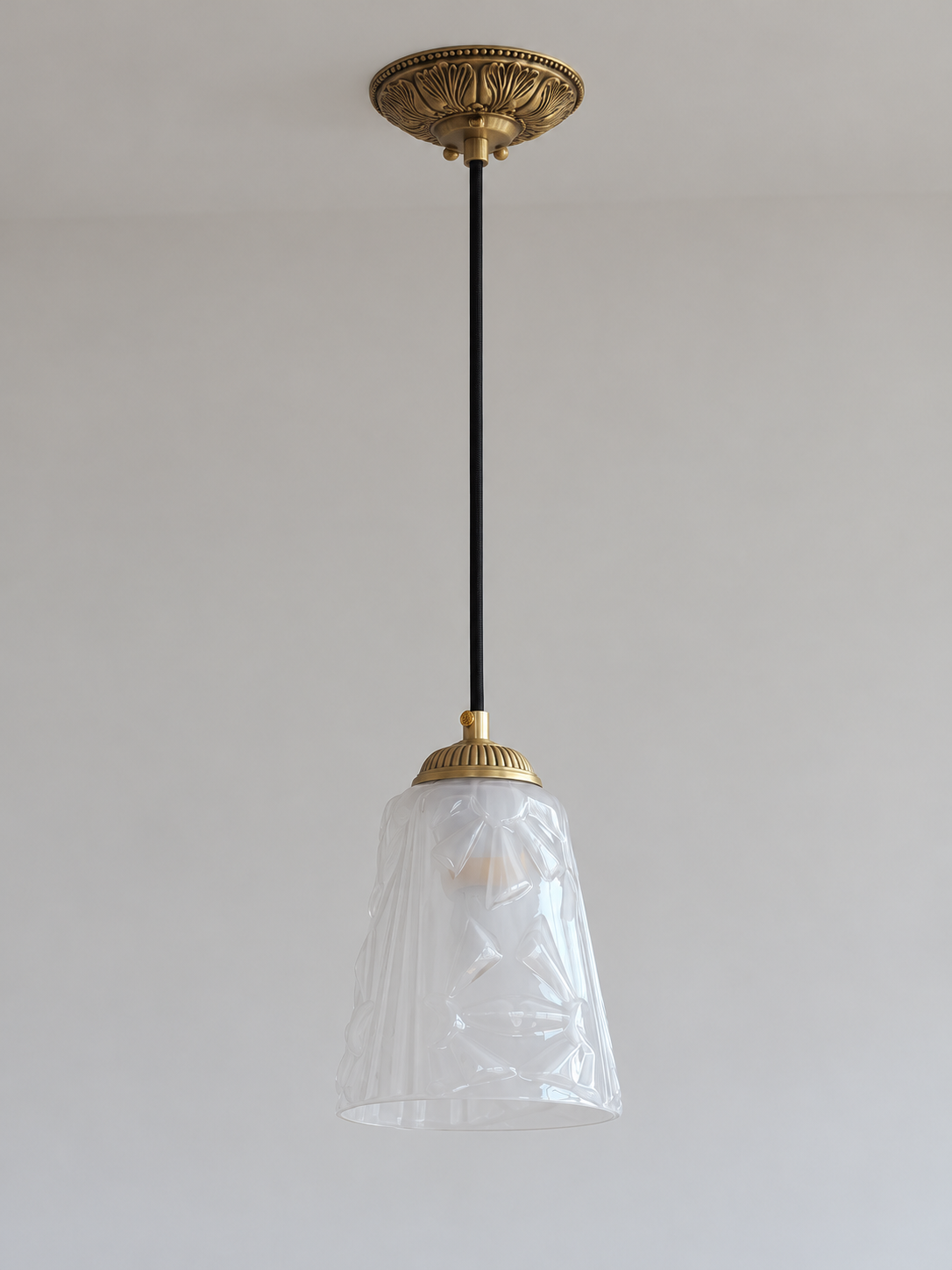 Copper-Tone pendant with translucent patterned glass cone, shown unlit, product view