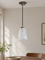 Antique Silver pendant with translucent patterned glass cone, shown unlit, daylight dining-room setting