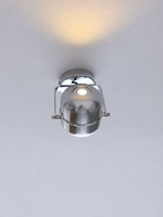 Chrome capsule ceiling spotlight, black tilted