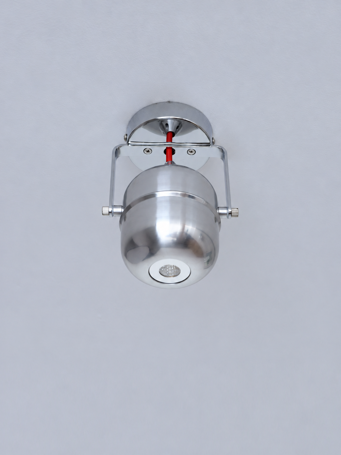 Chrome capsule ceiling spotlight, red off