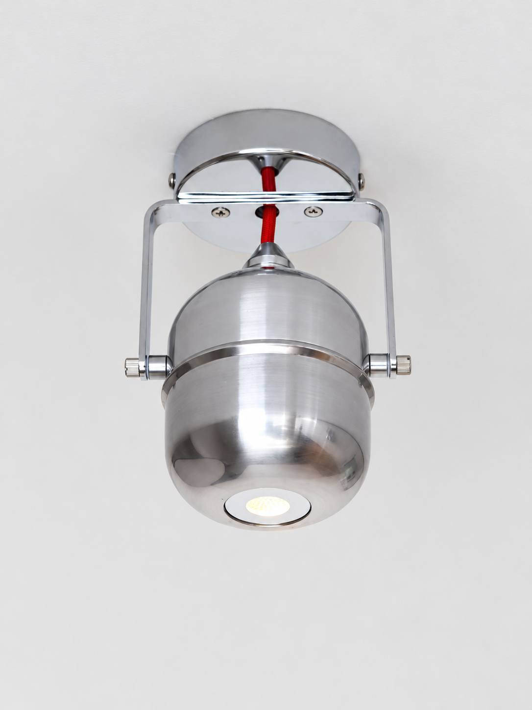 Chrome capsule ceiling spotlight, red sku