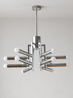 Chrome geometric12-light chandelier with milk white light sources, shown unlit in a hero composition