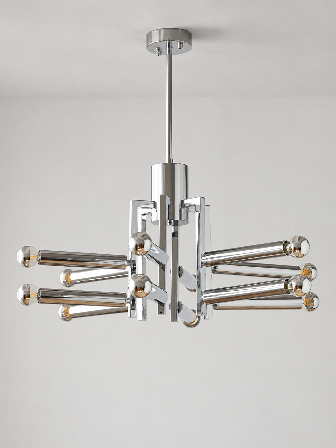 Chrome geometric12-light chandelier with half-plated mirror light sources, shown unlit in a detail composition
