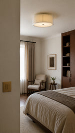 Mercer ceiling light in a quiet-luxury bedroom reading corner