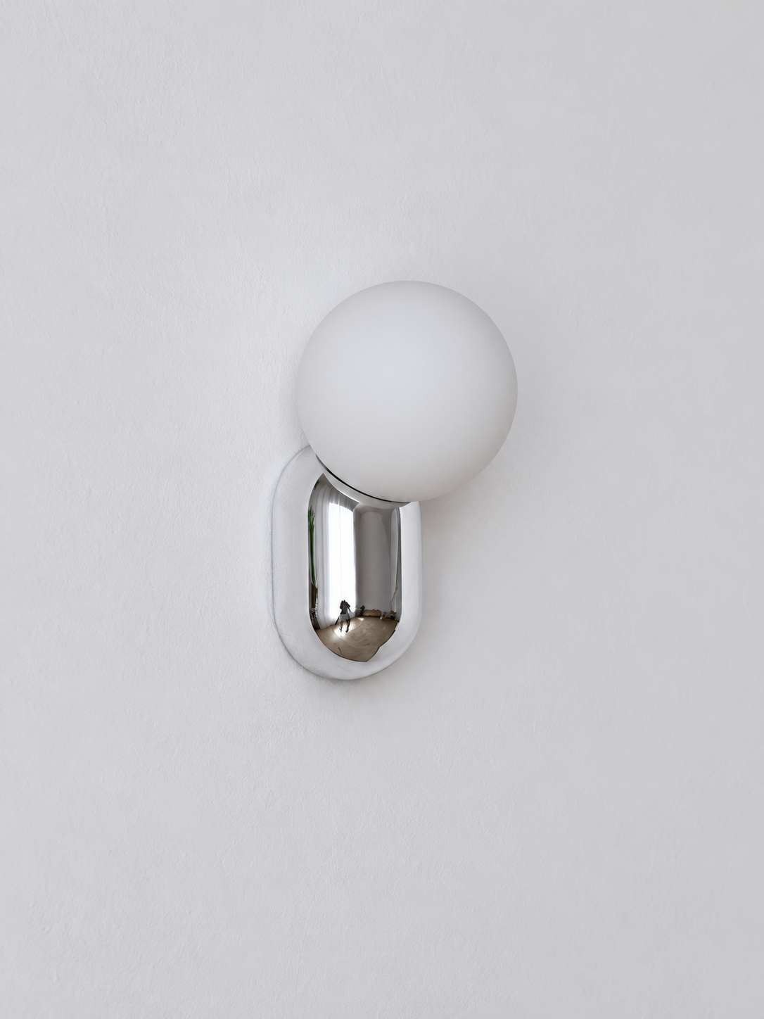 chrome capsule and opal globe wall light