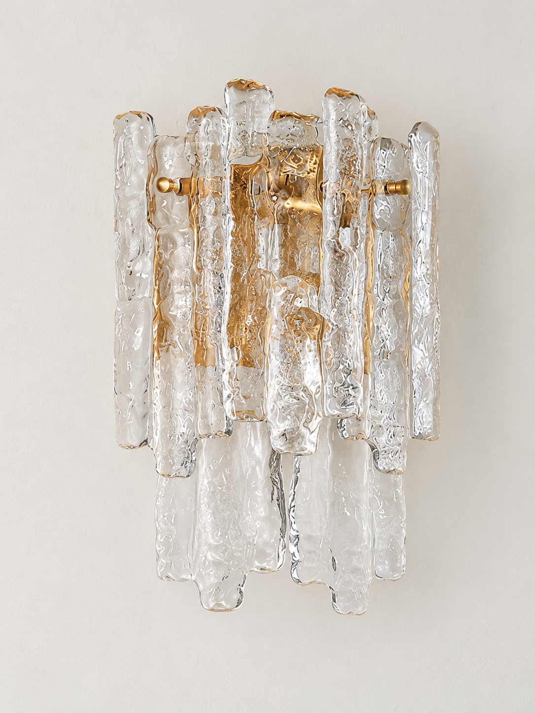 Clear textured ice glass wall sconce with copper-tone frame, front view