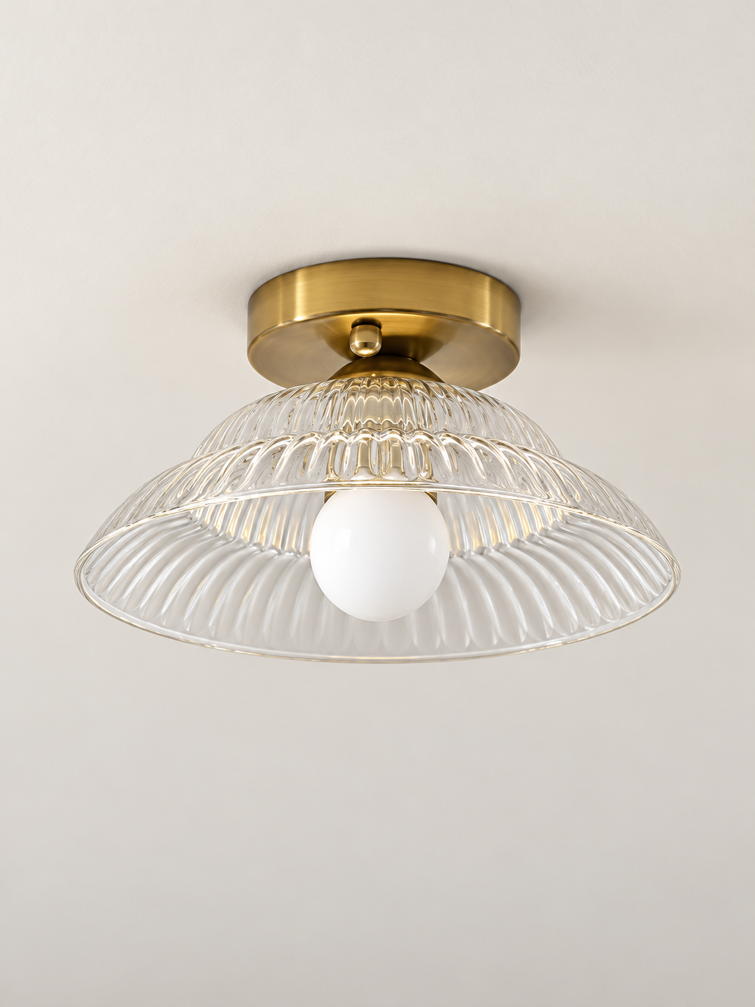 Ribbed flared glass flush mount ceiling light, clear glass
