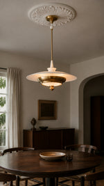 Aurelia Halo pendant light in a French mid-century dining room