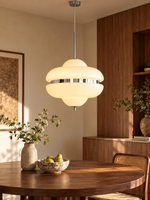 Cloud Saucer glass pendant with warm illustrative illumination