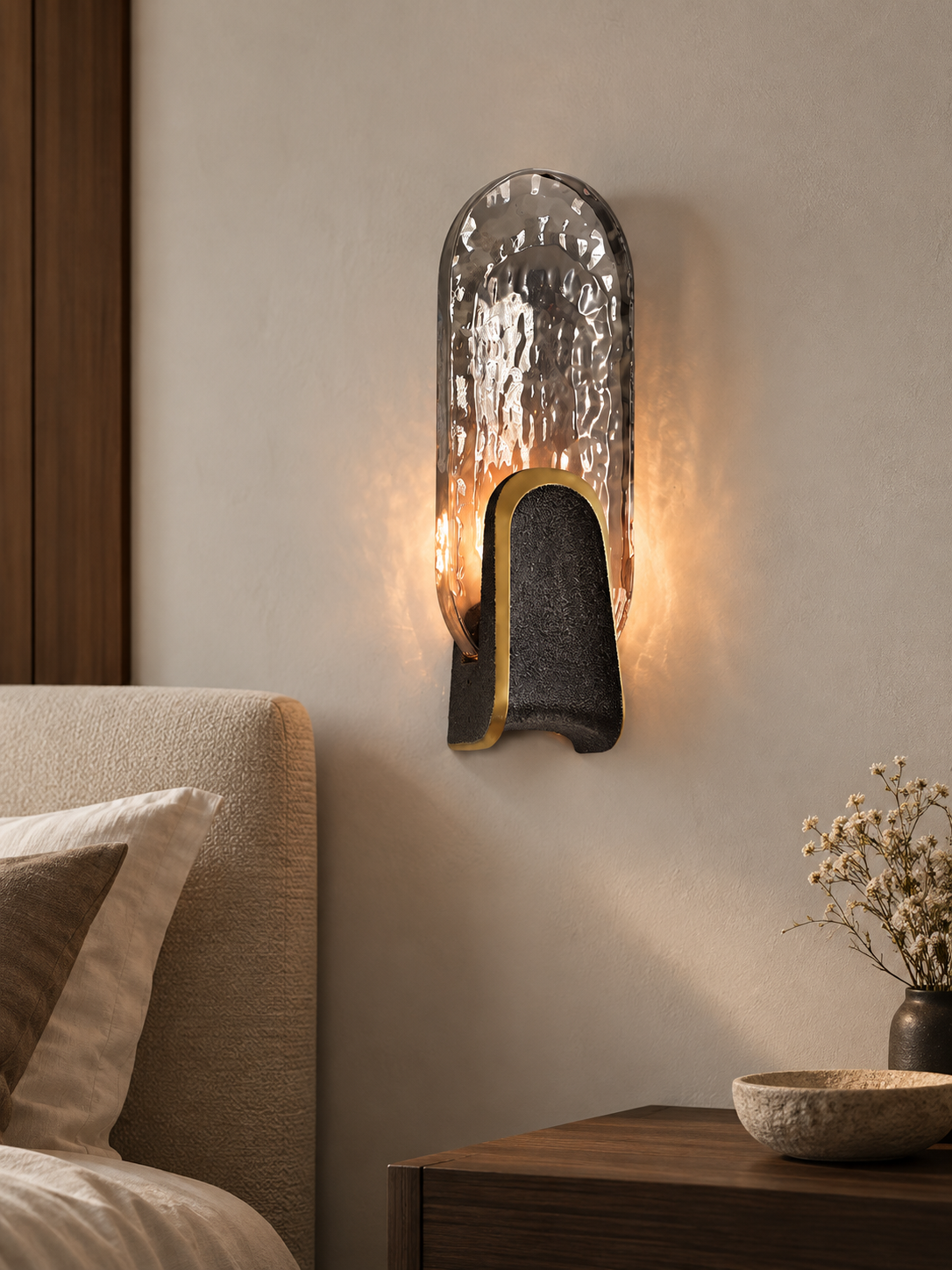 Halo Crest oval smoke gray textured glass LED wall light in a bedroom