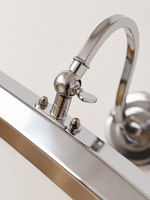 Chrome swivel and faceted shade detail