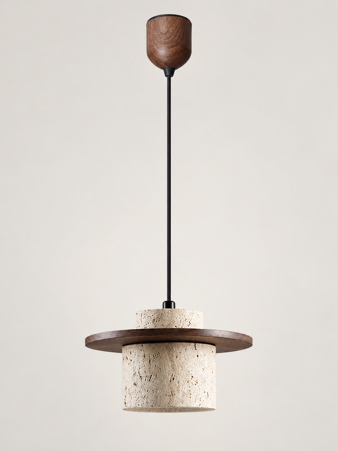 Travertine and wood pendant, dark walnut tone, single stone-cylinder shade with a flat wood disc and adjustable-lift ceiling housing, fixture switched off