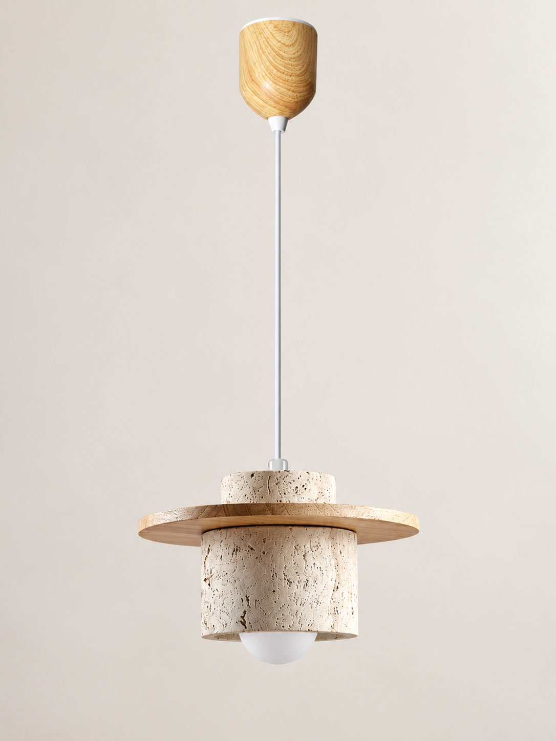 Travertine and wood pendant, natural wood tone, single stone-cylinder shade with a flat wood disc, adjustable-lift ceiling housing and projecting white bulb, fixture switched off