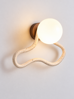 Travertine Loop Glass Globe Wall Sconce 60682, warm light on – image 5