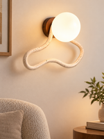 Travertine Loop Glass Globe Wall Sconce 60682, warm light on – image 6