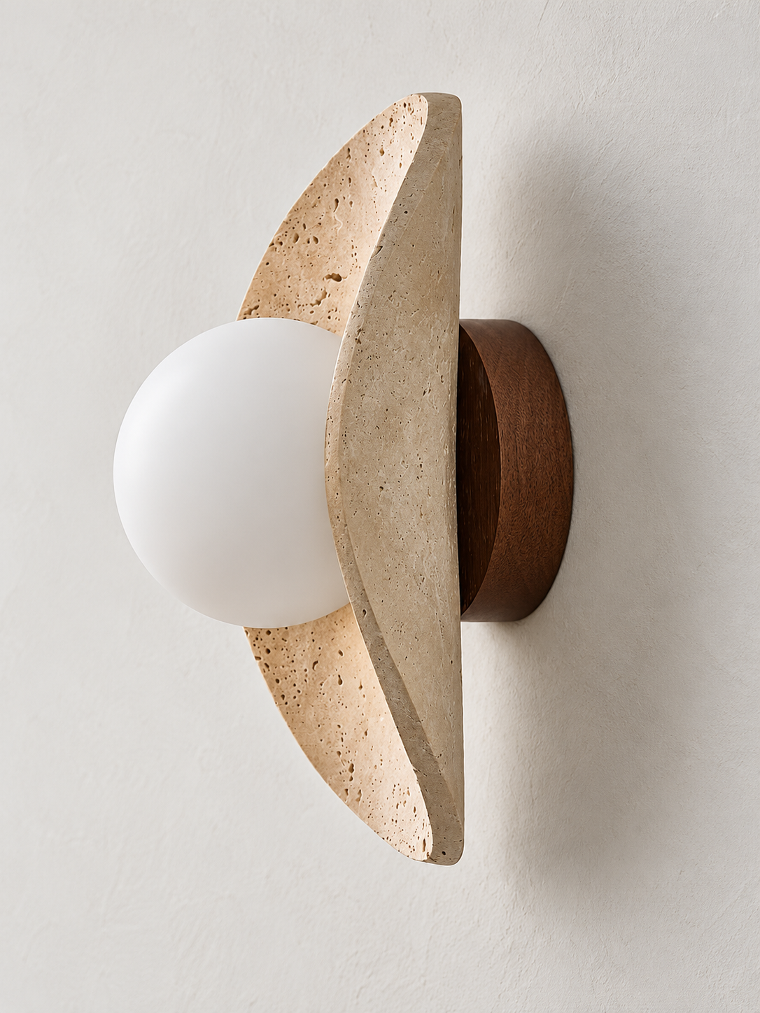 Sculpted Travertine Globe Wall Lamp — product view