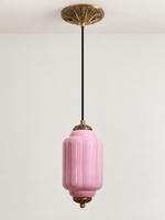 Purple ribbed glass pendant with copper-tone hardware and embossed canopy, shown switched off in daylight
