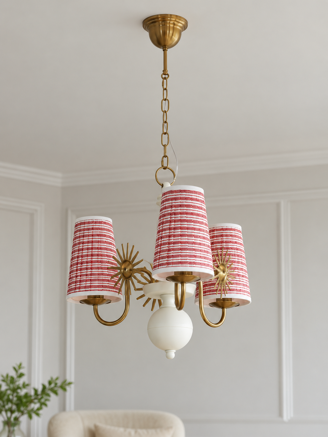 Copper-tone and white 3-light chandelier with red-and-white striped fabric shades, shown switched off