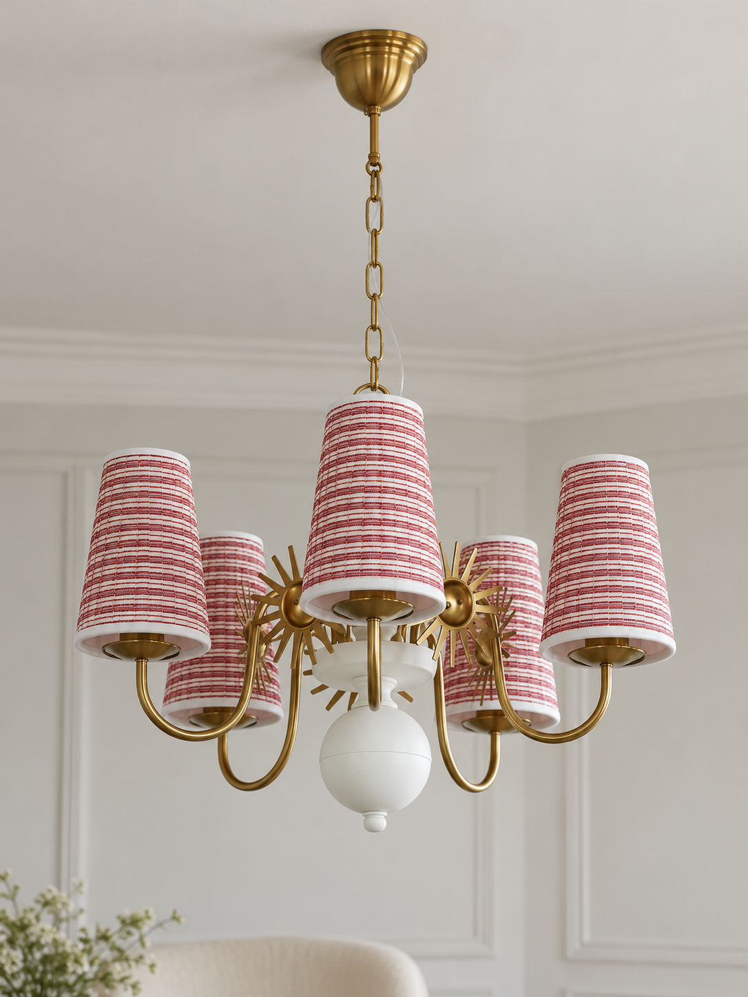 Copper-tone and white 5-light chandelier with red-and-white striped fabric shades, shown switched off