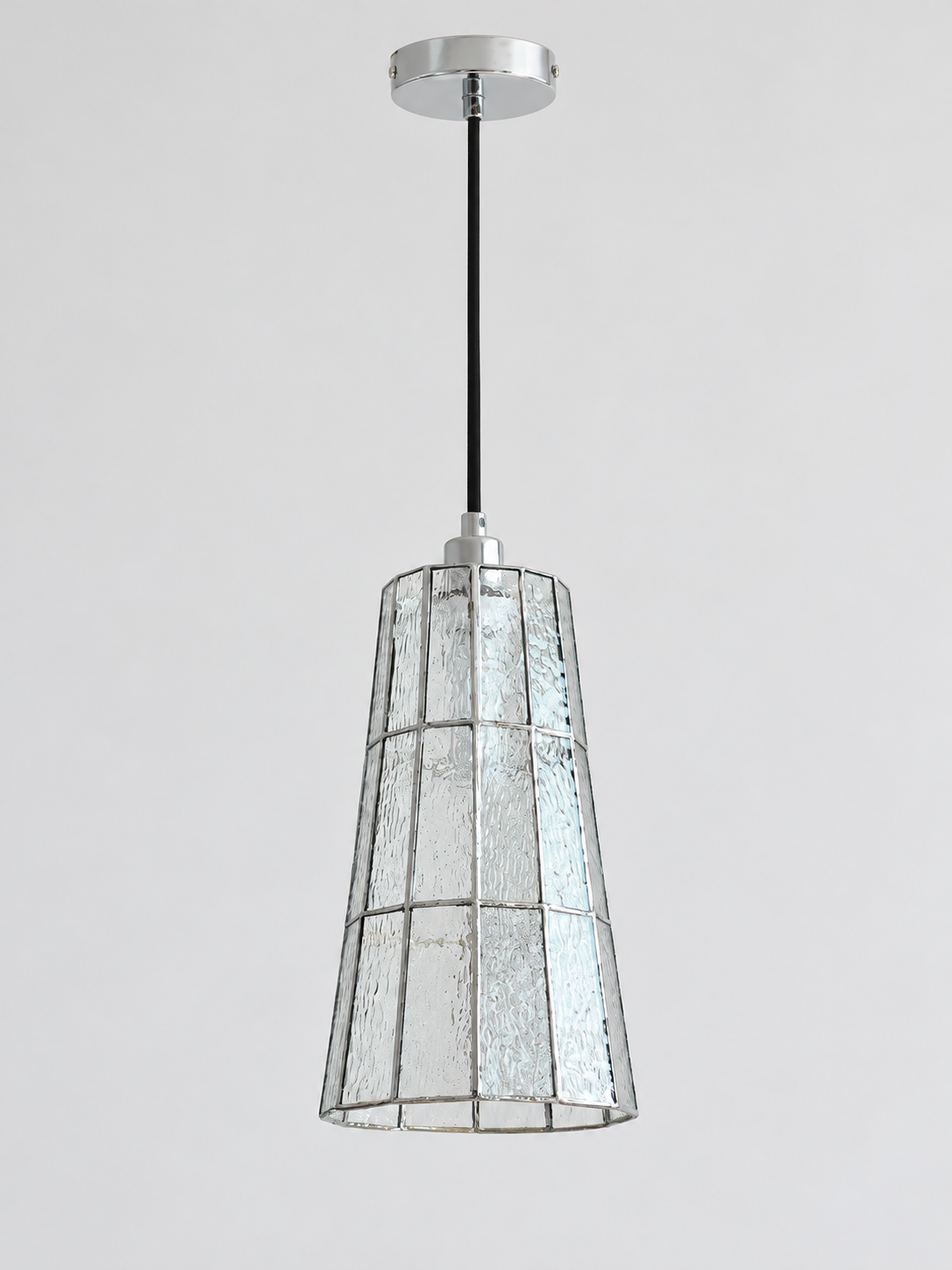Clear tall tapered mosaic glass pendant with silver-tone canopy and black cord, shown switched off